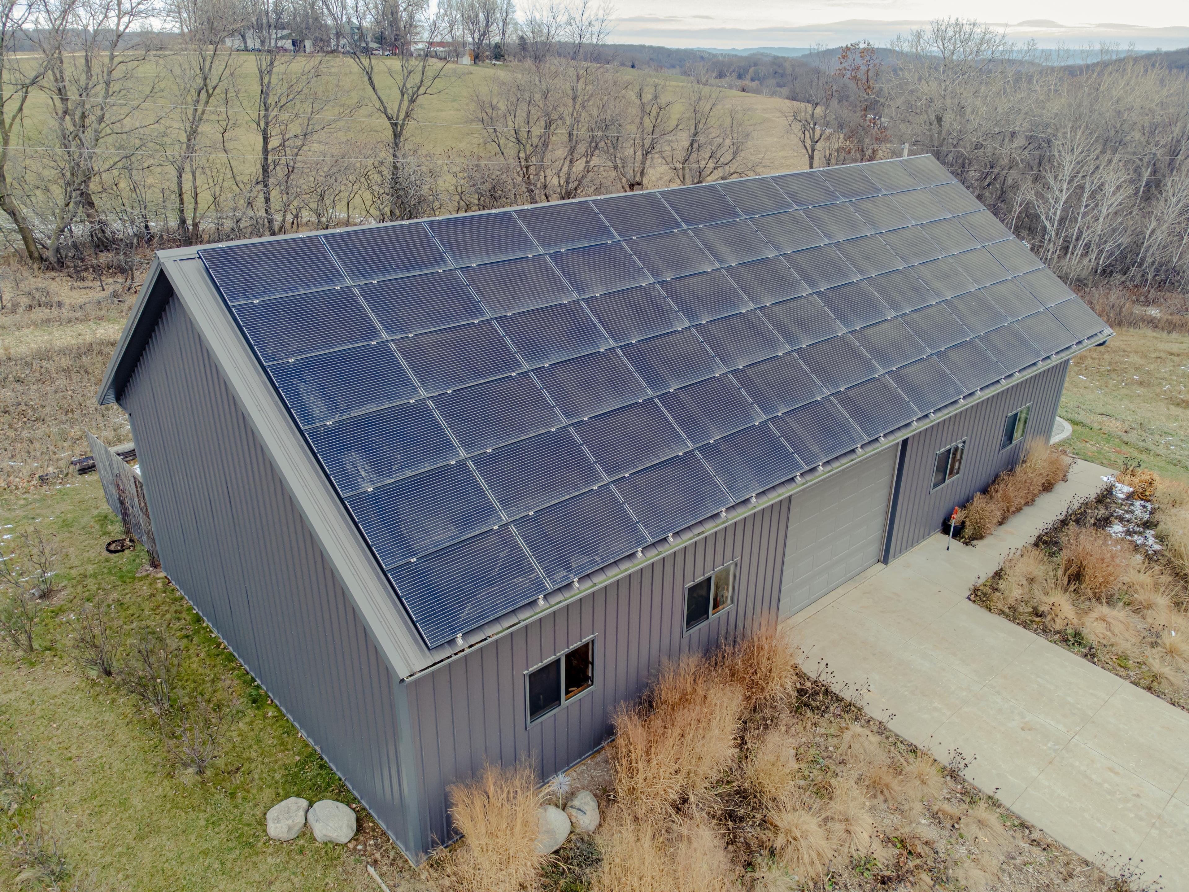 Solar panels racked on corrugated metal roof